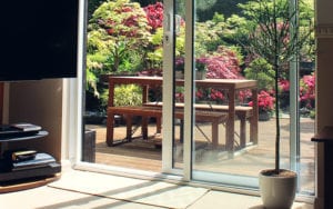 an unlocked, open sliding glass door