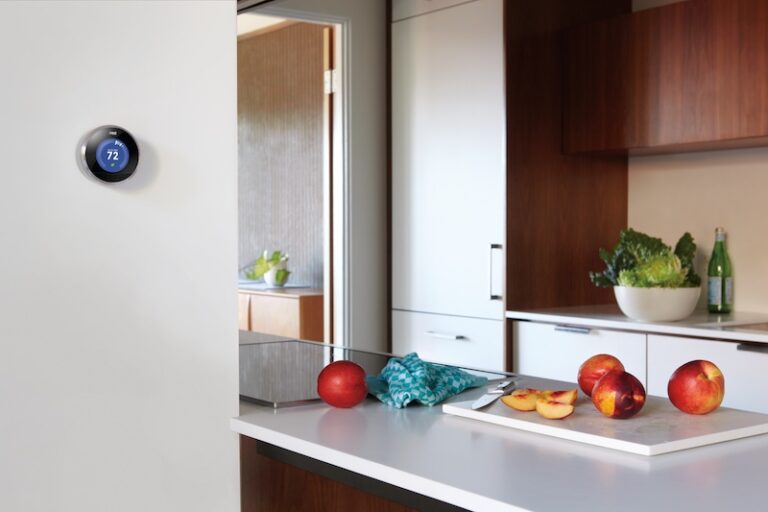 Nest Learning Thermostat installed in a kitchen