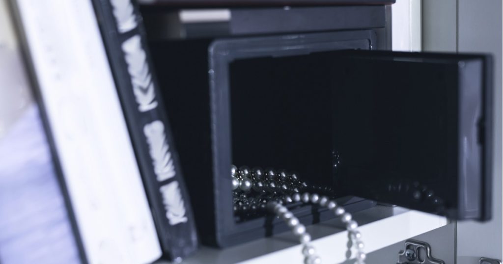 open safe with jewelry inside