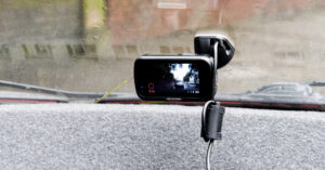 Nextbase 322GW dash cam fixed to the dash of a car