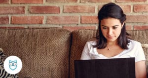 Woman using laptop in her home