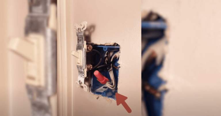 Open outlet with a white wire and two black wires.